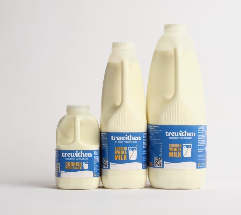 3 different sized cartons of trewithen whole milk