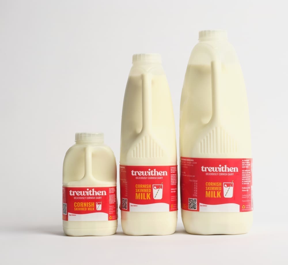 3 different sized cartons of trewithen skimmed milk