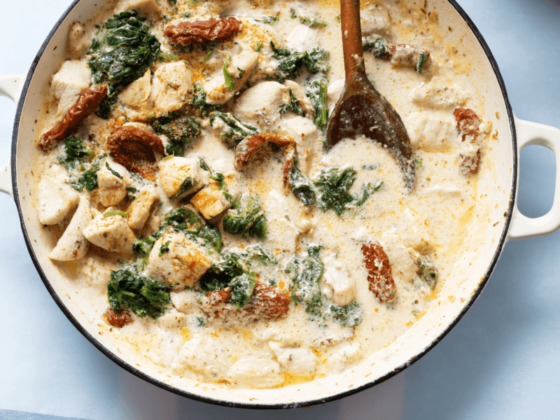 Stir Through Pasta in a pot with wooden stirring spoon