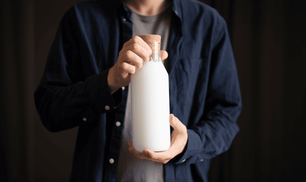 Man holding glass of milk